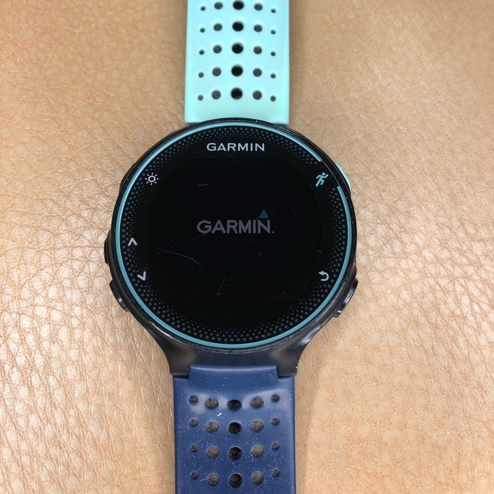 Garmin Forerunner 235 watch and charger